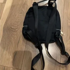 lululemon athletica mini Backpack with Gold Accents or crossbody bag. Like new. lululemon athletica | Bags | Lululemon Black Mini Backpack  main image 4